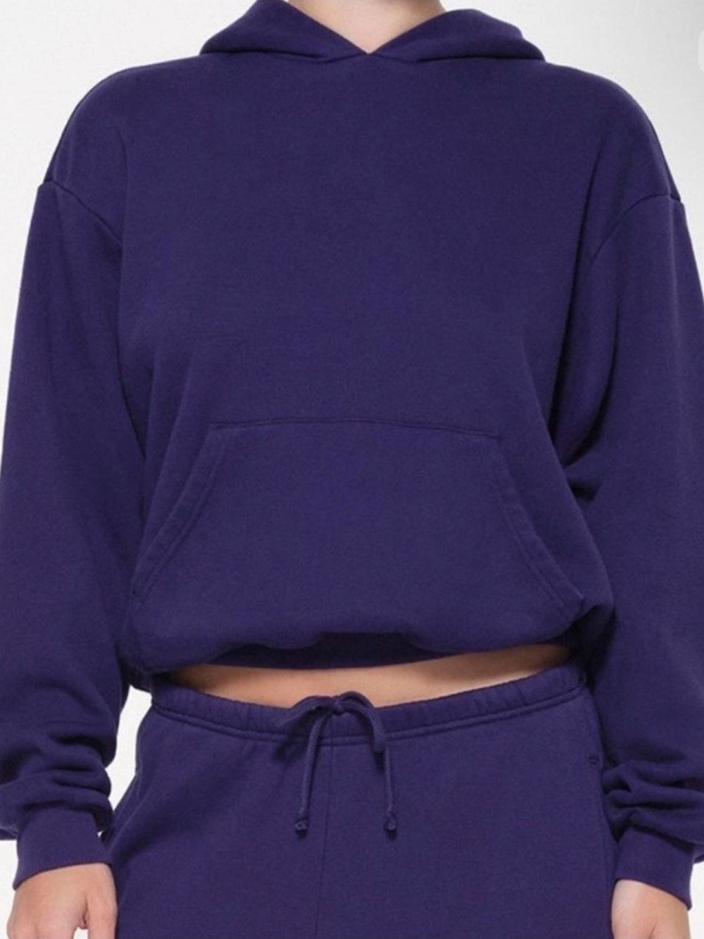 SKIMS cotton fleece Hoodie in Deep Purple. I wear size S and this fits perfect.